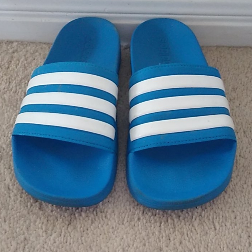 Blue adidas slides